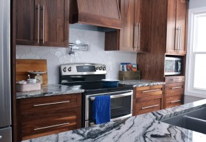 fish scale tiles, ogee tile, ogee drop, The Crux, backsplash, grey granite, walnut cabinetry