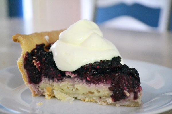 blackberry custard pie with a blackberry reduction sauce