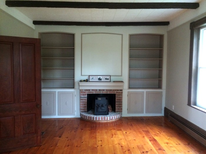 whitewash on red brick fireplace