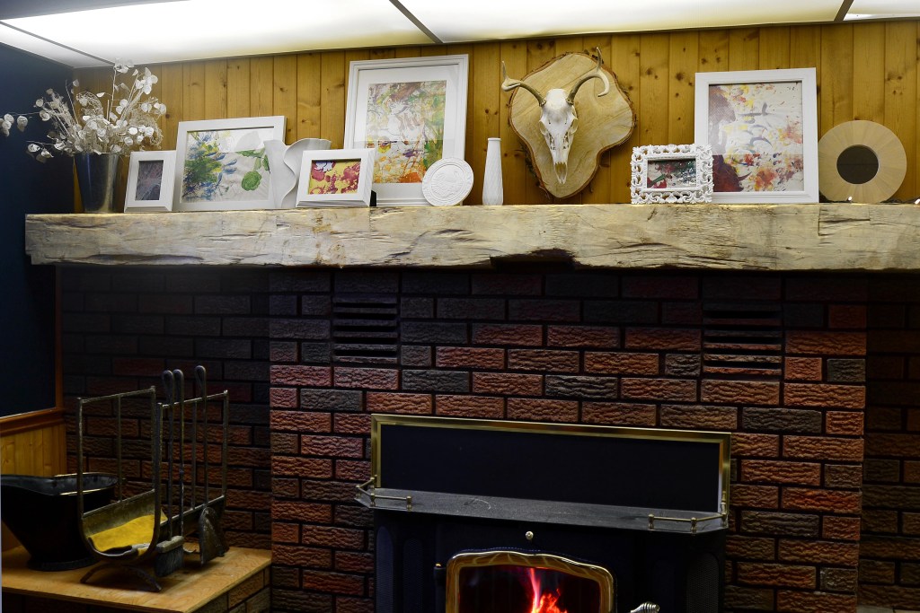 Before the grey paint wash, red brick fireplace makeover